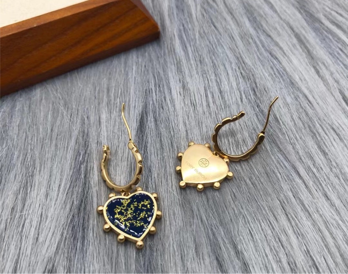 New Tory Burch woman earring